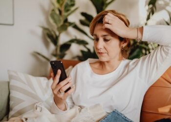 Woman shocked after finding her husband's secret phone hidden in a drawer